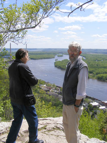 Bill and Julie Burke on a high bluff overlooking the Mississippi River and the town of Alma