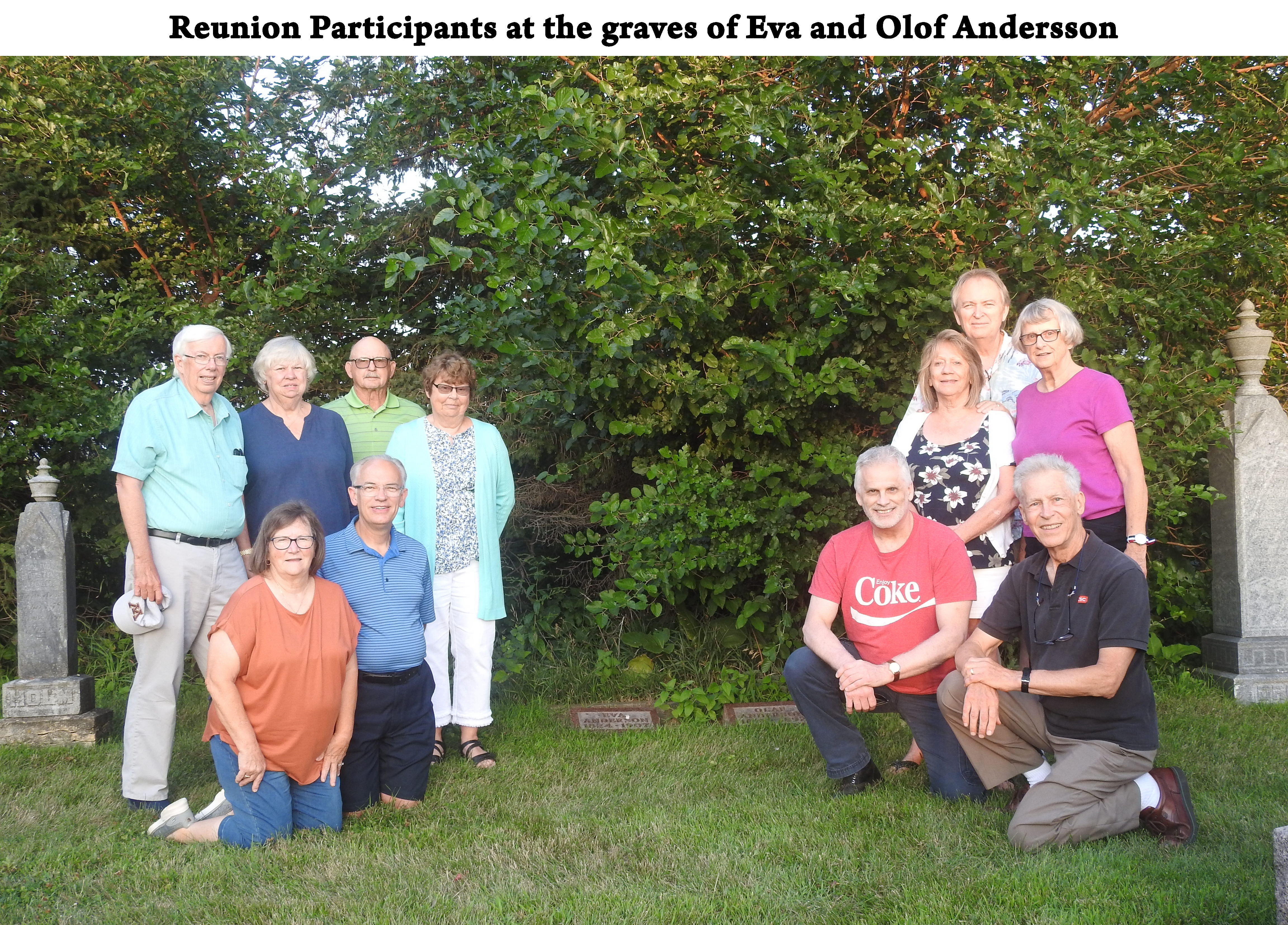 The great-great-grandchildren and their spouses are on each side
           of their graves 