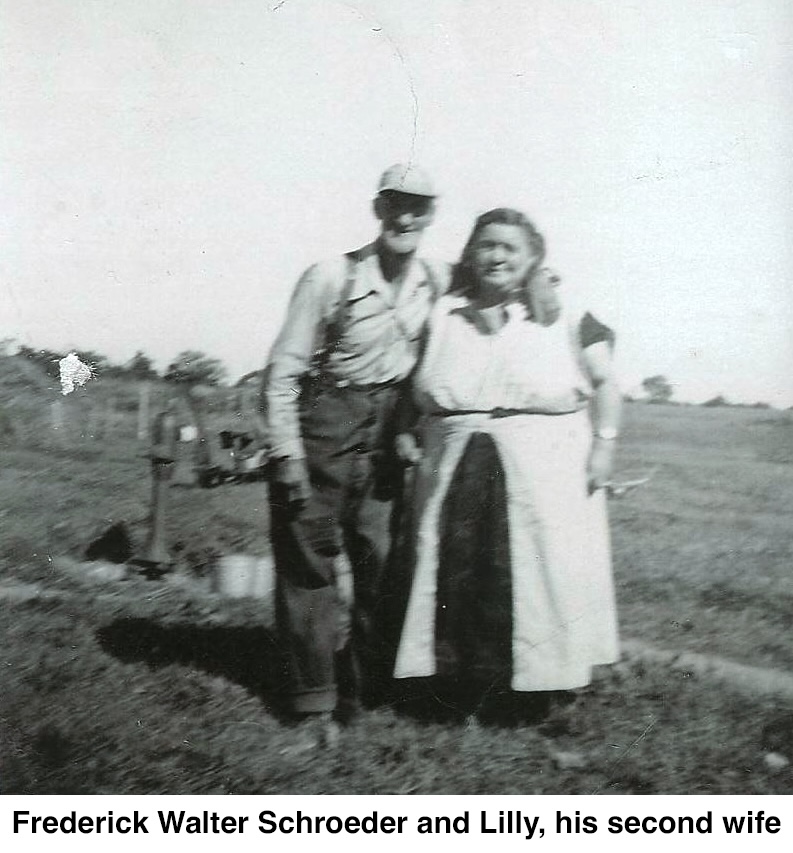 Frederick Walter Schroder is standing in a field with his arm around 
           Lillian, his second wife