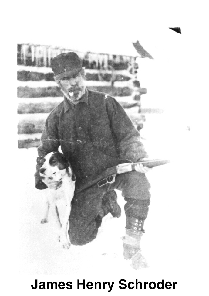 He is kneeling on one knee, holding a rifle, and a dog. A log cabin 
       is in the background.