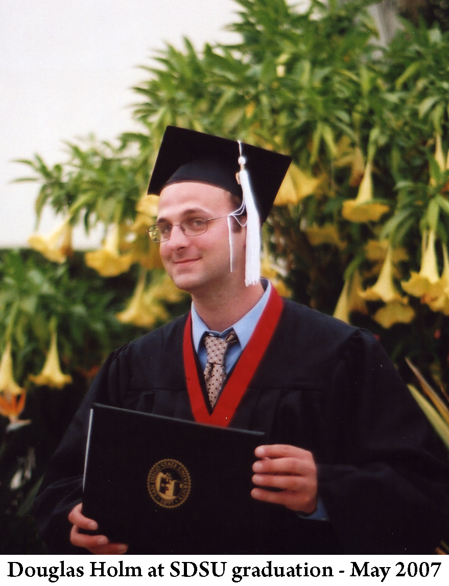 Doug Holm receiving graduaton certificate at SDSU