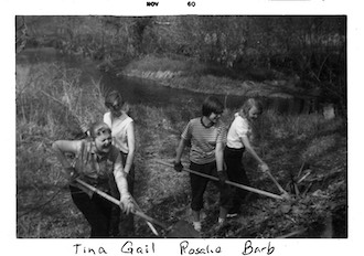 Gail Paton and three friends with rakes and shovels are cleaning the 
              bank of the stream behind them