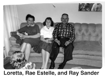 Loretta, Rae Estelle, and husband Ray Sander seated on a sofa.