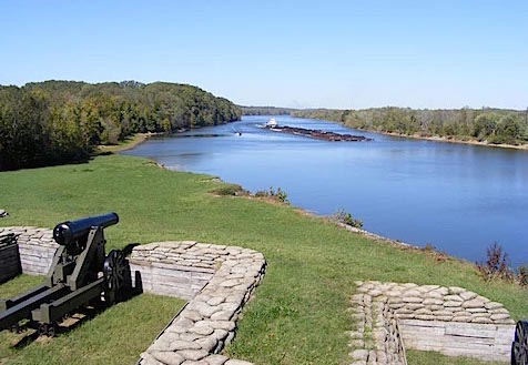 A coal barge comes up the Cumberland River              under the muzzles of one of the cannon of the lower battery