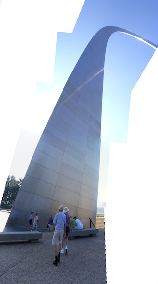 A panorama showing the base of the north leg of              the Gateway Arch and continuing up to the peak