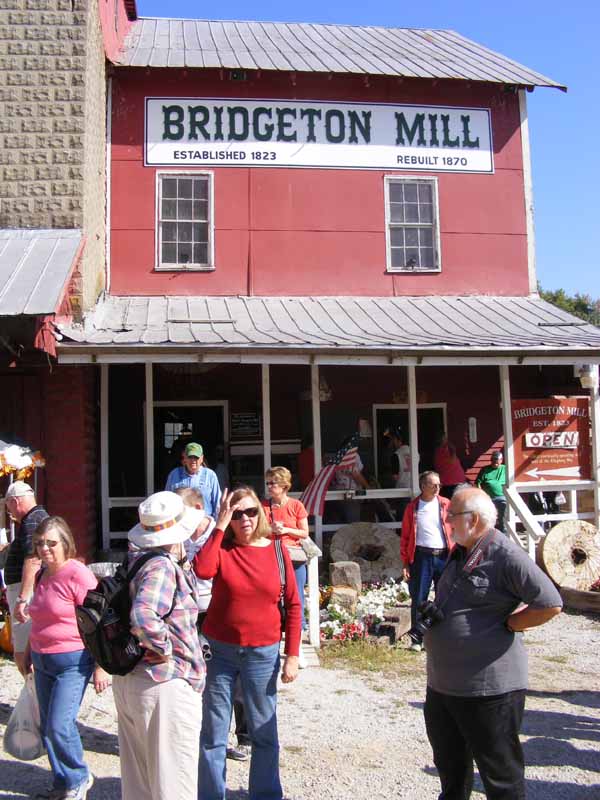 Gail Holm & Ann and Bob Zink at the red-painted Bridgeton Mill