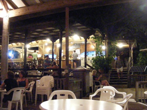 The restaurant
with lights on as seen from the dining pavilion